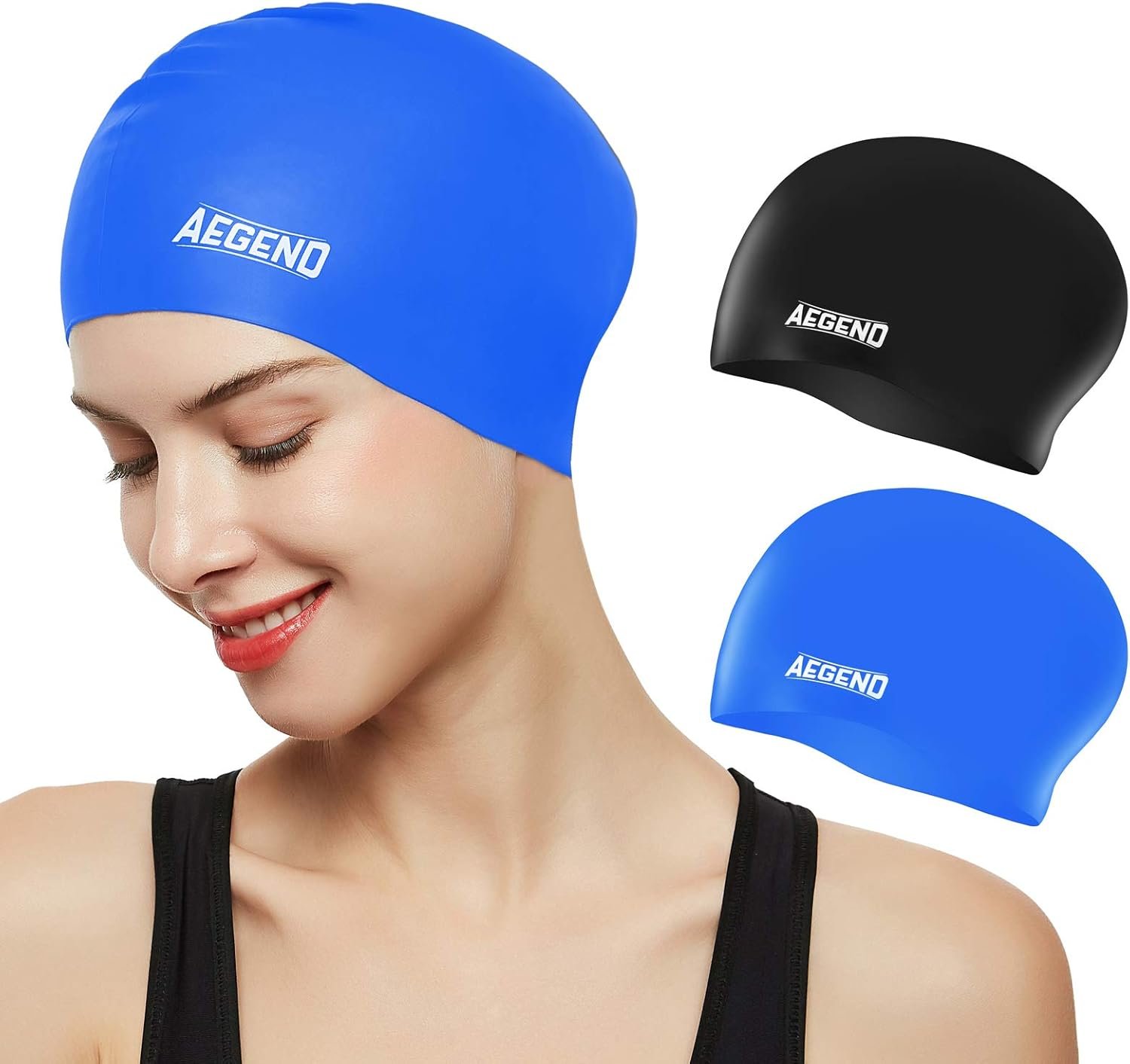 An image of several colorful swim caps arranged neatly. The caps are made of smooth silicone material and come in various bright shades like blue, red, yellow, and green. Each cap has a snug, rounded shape designed to cover the head and ears, reducing drag while swimming. The smooth texture reflects light, showing the slight stretchiness of the material.